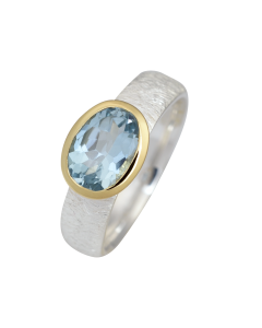 Eleganter Ring mit blauem Topas, teilvergoldet